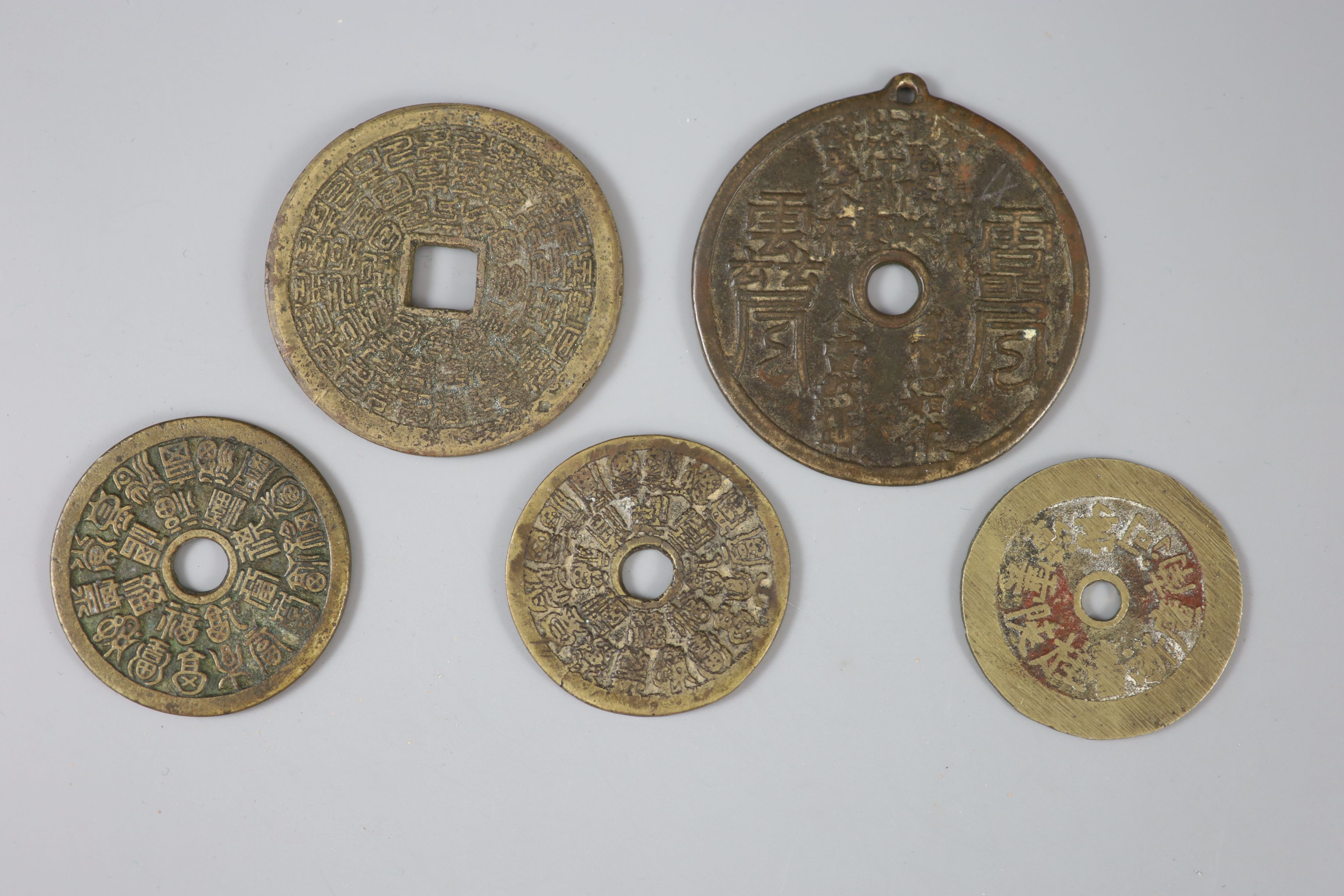 China, 5 large cast bronze charms or amulets, Qing dynasty,